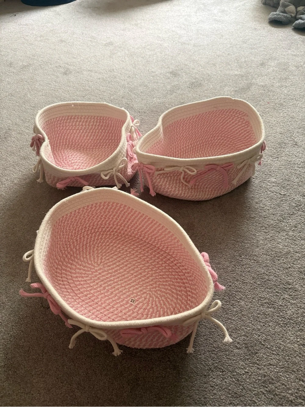 Set of 3 Pink Woven Rope Baskets with Cream Trim with bows attached